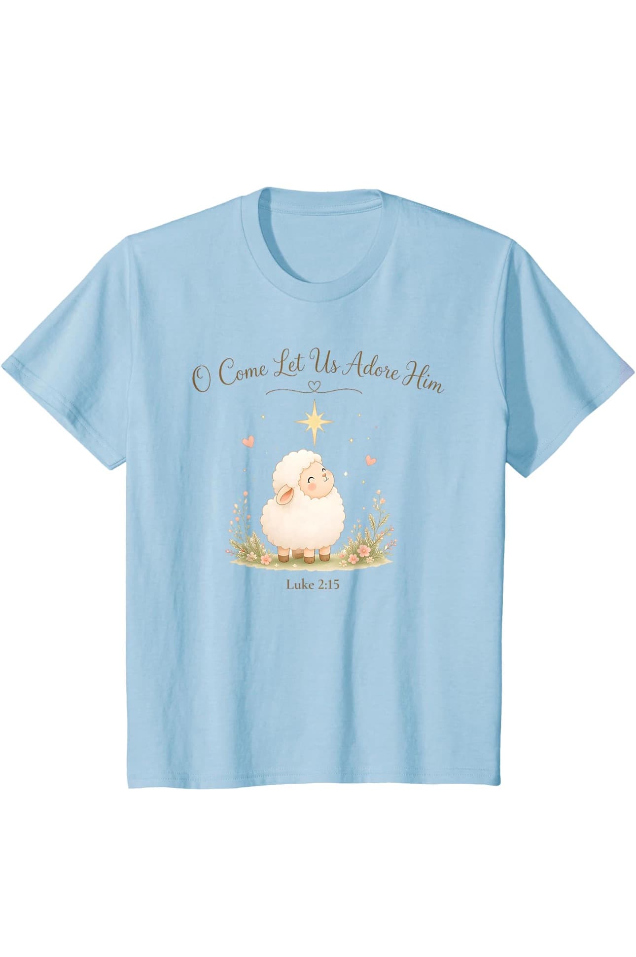 Light blue children's tee with a smiling lamb under a star and the words O Come Let Us Adore Him, Luke 2:15